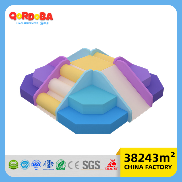 Custom toddler soft play space with slides and climbs for gentle indoor playground games