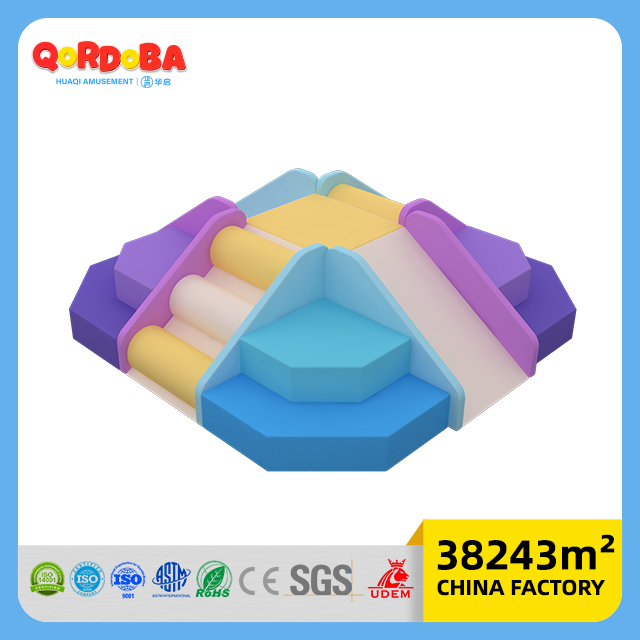 Custom toddler soft play space with slides and climbs for gentle indoor playground games
